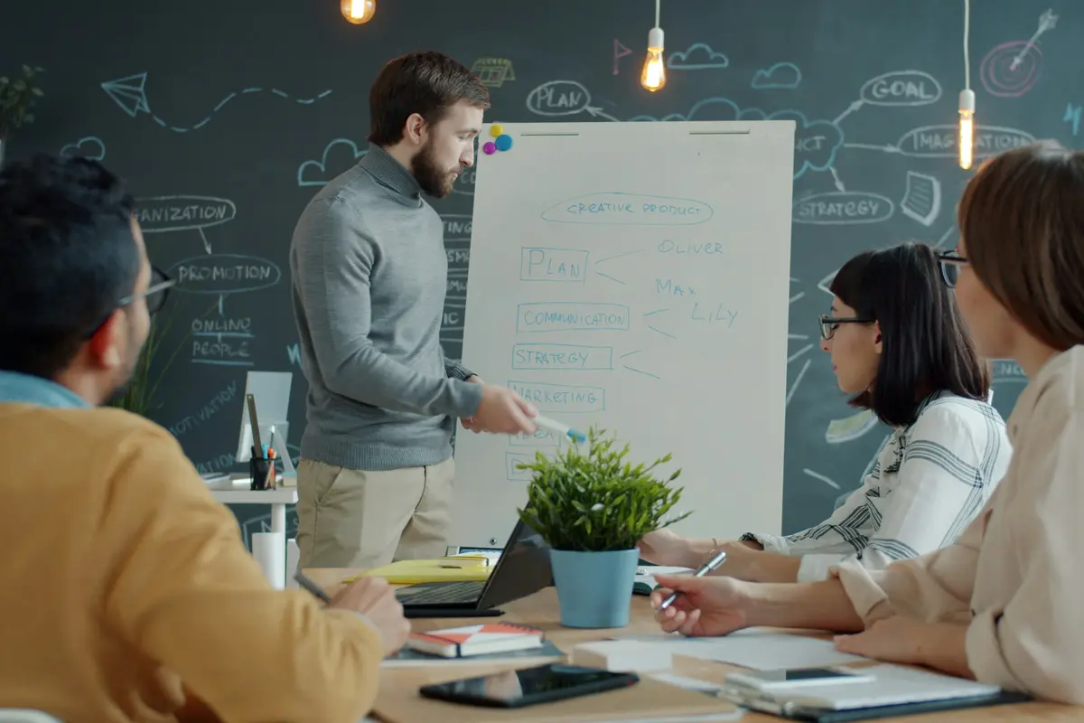 Managers reviewing published rosters during a compliance meeting